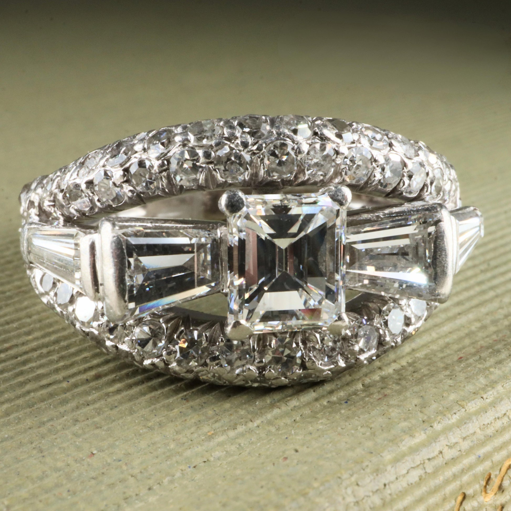 Mid Century 0.80 Carat Emerald Cut Diamond Platinum Ring